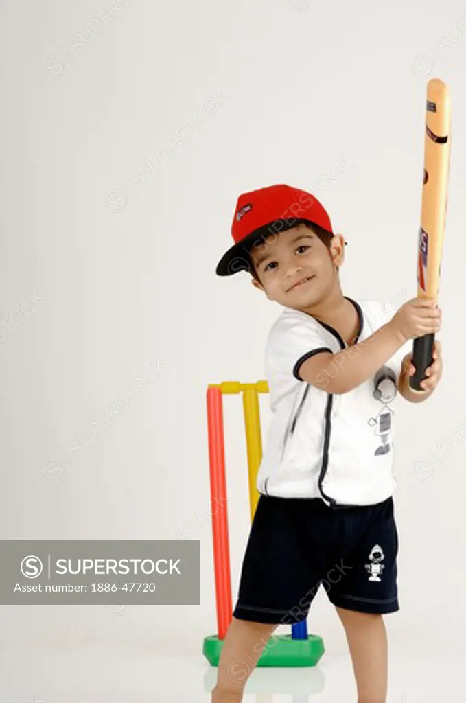 Indian Boy swinging bat in the Air Superhit playing cricket  ; MR