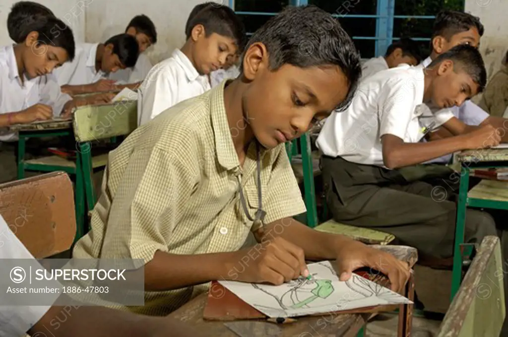 Boys in classroom of school at Ralegan Siddhi near Pune, Maharashtra, India