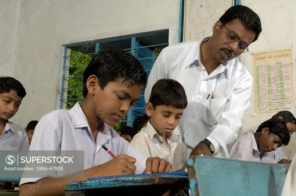 Boys in classroom of school at Ralegan Siddhi near Pune, Maharashtra, India