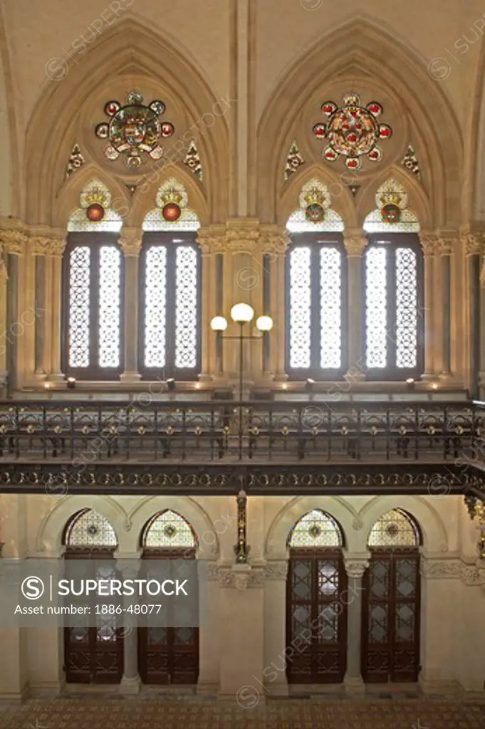 Stained glass and arches of interior of Mumbai University convocation hall built in Gothic style of architecture ; Bombay Mumbai ; Maharashtra ; India
