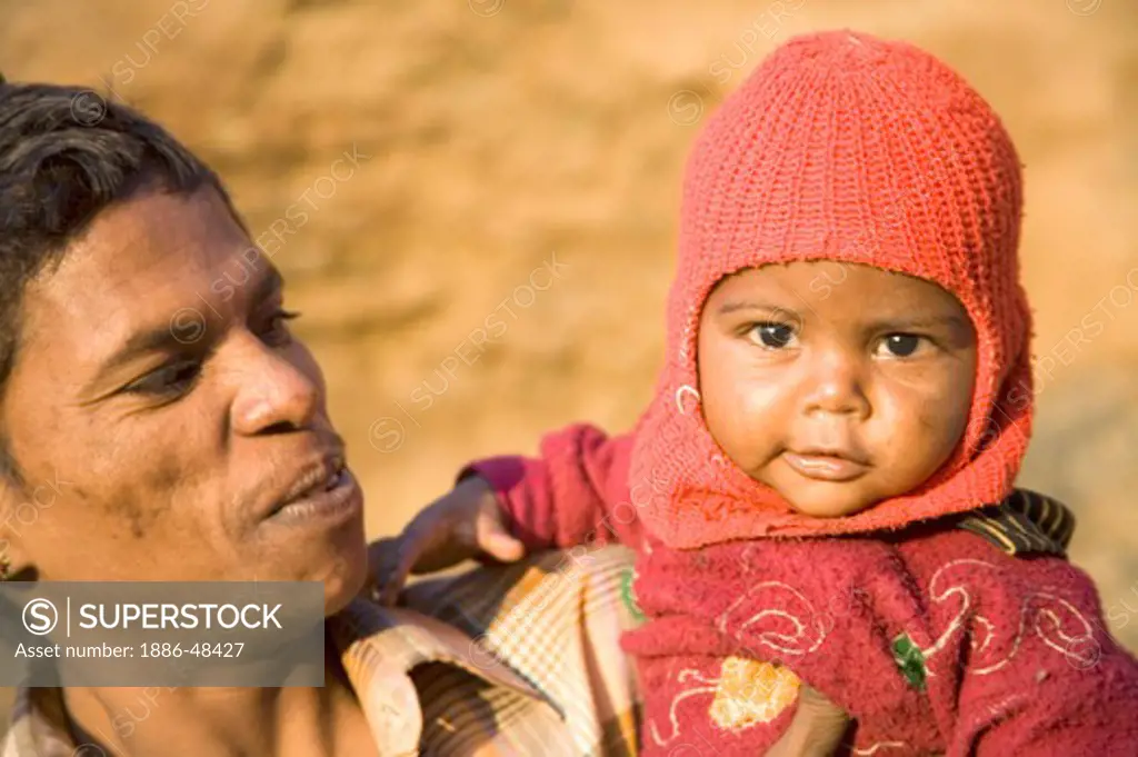 Man with girl child ; semi urban village Dilwara ; Udaipur ; Rajasthan ; India