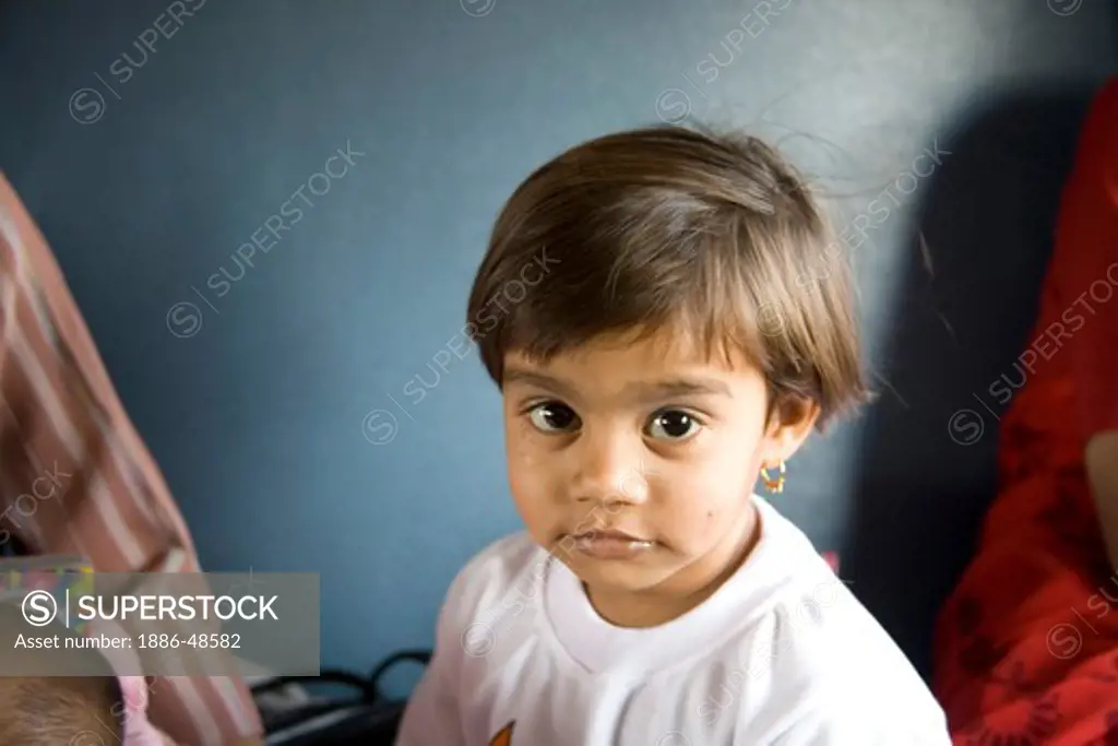 Innocence expression on face of girl ; Bombay Mumbai ; Maharashtra ; India