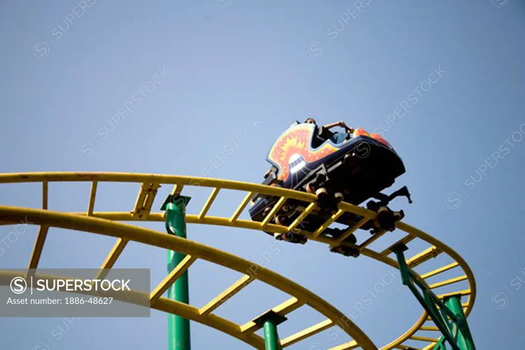 People enjoying on ride in Amusement park Tikuji ni wadi ; Bombay Mumbai ; Maharashtra ; India