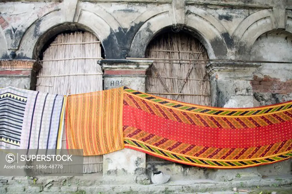 Colorful saree in the haveli ; village Tauta; district Manikgunj ; Bangladesh