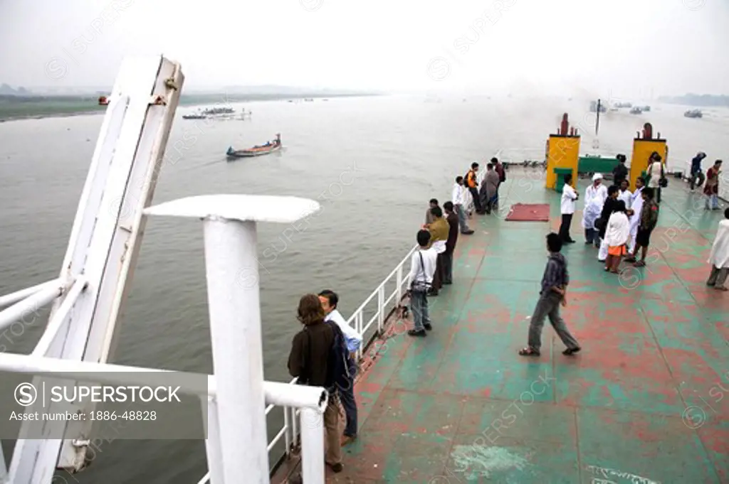 People traveling in Cruise boat in Burigunga Buri Gunga River ; Sadarghat Boat terminal ; Dhaka ; Bangladesh