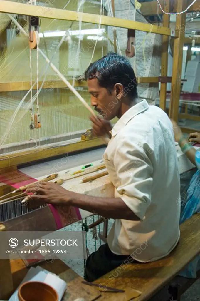 Weaver weaving silk handloom ; Kanchipuram ; Tamilnadu ; India