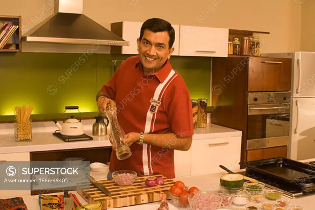 Sanjeev Kapoor one of the top chefs in the world preparing food NO MR