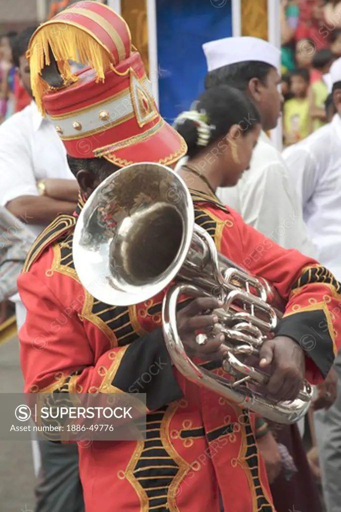 Musical Blowing instrument Euphonium ; Artist playing Euphonium in a Band ; during the religious procession