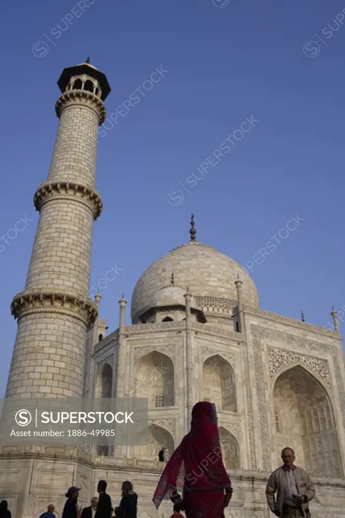 Tourists at  Taj Mahal in pond Seventh Wonders of World on the south bank of Yamuna river ; Agra ; Uttar Pradesh ; India UNESCO World Heritage Site