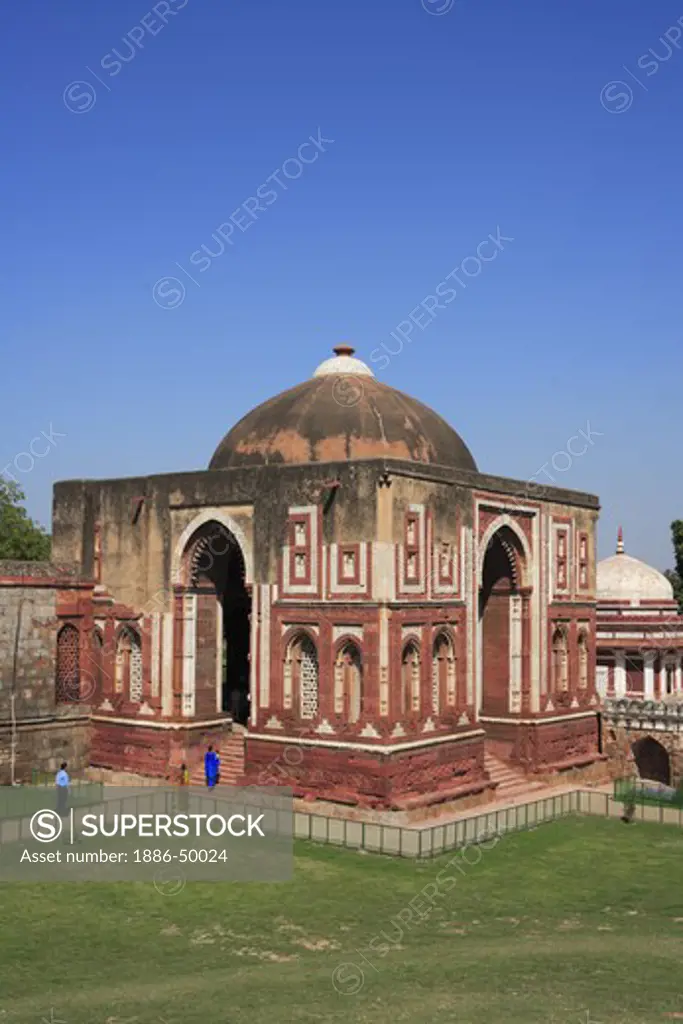 Alai Darwaza and Imam Zamin's tomb in Qutab Minar complex built in 1311 red sandstone ; Indo-Muslim art ; Delhi sultanate ; Delhi; India UNESCO World Heritage Site