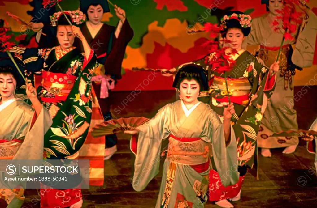 Group of Maiko dancers in traditional dress (Potocho Odori) perform at the Pontocho Koberenje Theatre in Kyoto, Japan.