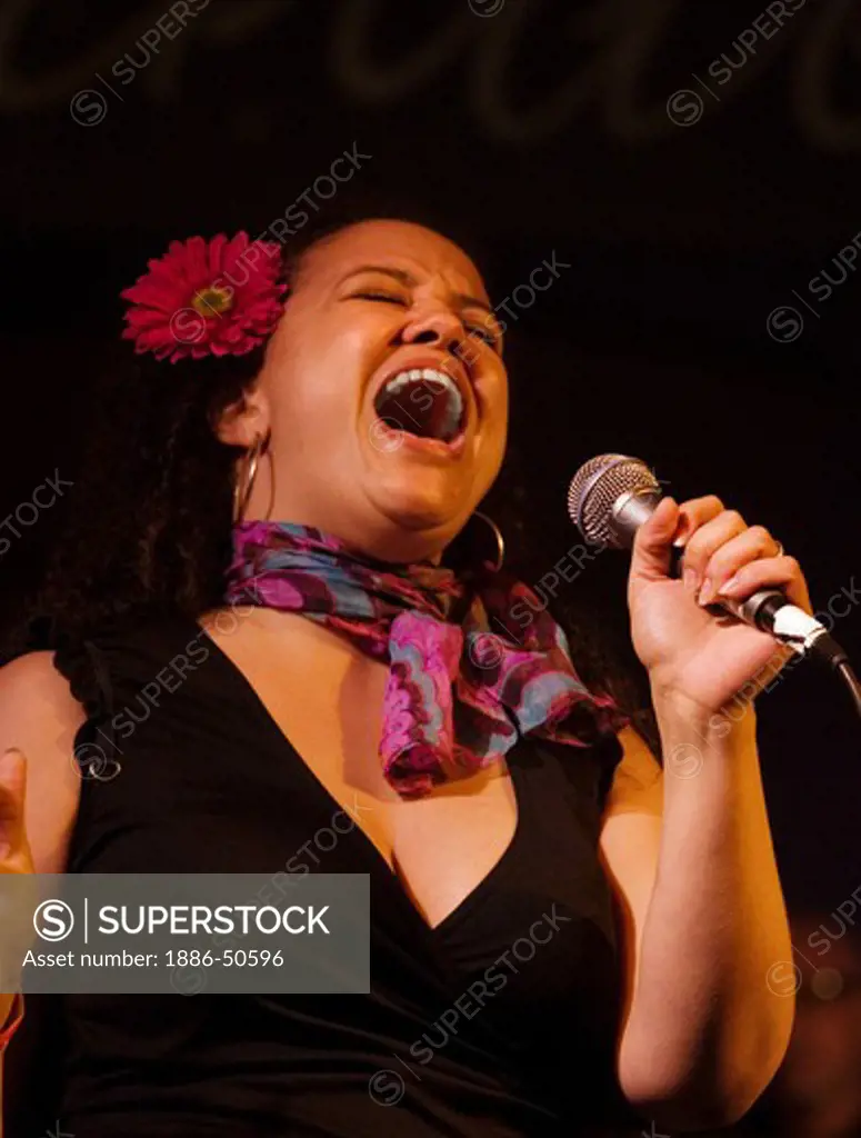 Female vocalist performs during a tribute to Ray Charles at the MONTEREY BAY BLUES FESTIVAL - MONTEREY, CALIFORNIA