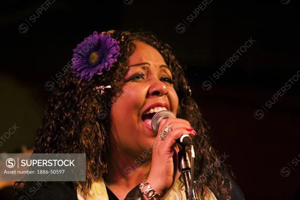 Female vocalist preforms during a tribute to Ray Charles at the MONTEREY BAY BLUES FESTIVAL - MONTEREY, CALIFORNIA