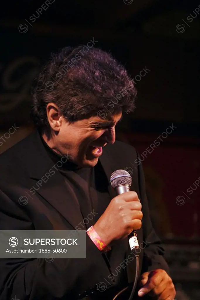 A crooner sings during a tribute to Ray Charles at the MONTEREY BAY BLUES FESTIVAL - MONTEREY, CALIFORNIA