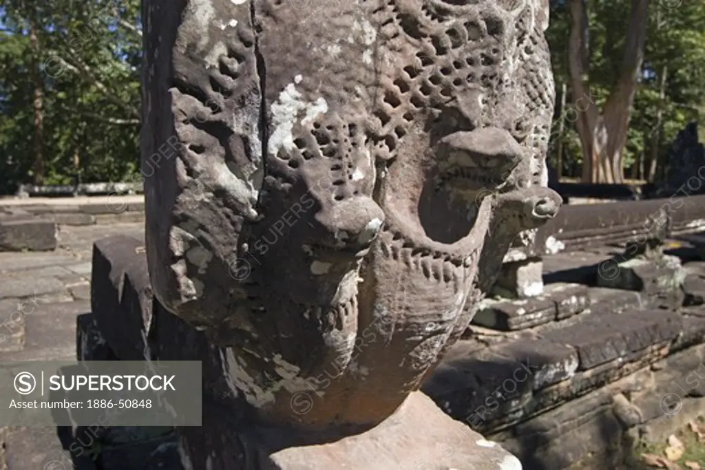 Naga balustrade on the terrace of Banteay Kdei, built by Jayavarman VII in the Bayon style, part of Angkor Wat - Siem Reap, Cambodia