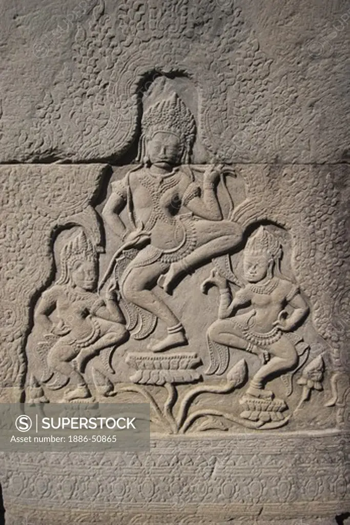 Sandstone bas relief dancing Apsaras (celestial maidens) at The Bayon, built by Jayavarman VII, in Angkor Thom  - Angkor Wat, Siem Reap, Cambodia
