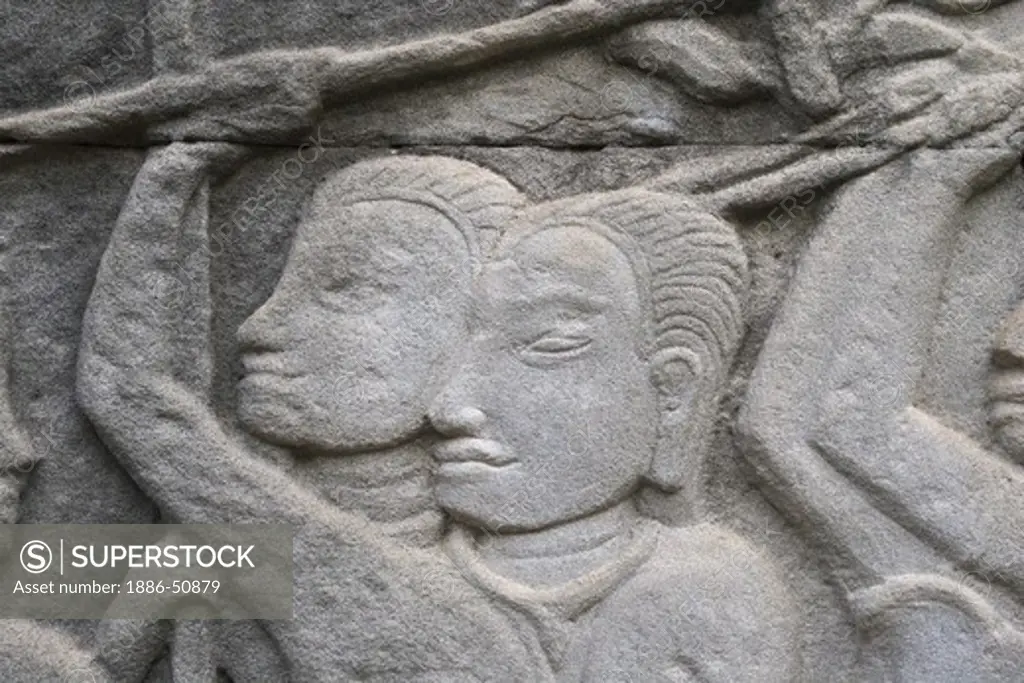 Sandstone bas relief of a historic battle at The Bayon, built by Jayavarman VII, in Angkor Thom  - Angkor Wat, Siem Reap, Cambodia