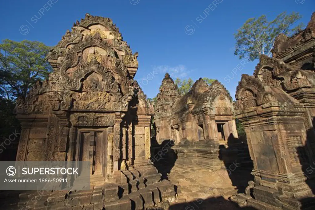 Hindu temples in the inner enclosure of Banteay Srei  in red sandstone, 10th century Khmer architecture at Angkor Wat -  Siem Reap, Cambodia