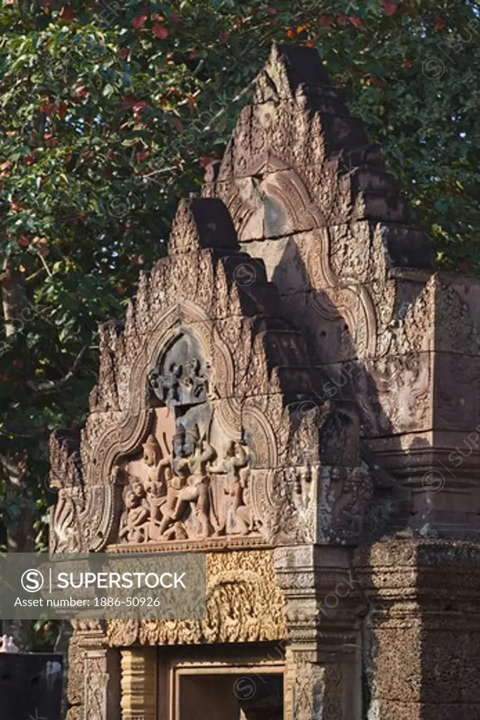 Red sandstone bas relief of Valin and Sugriva fighting on the W pediment of Gopura 1 at Banteay Srei, 10th century Khmer architecture at Angkor Wat -  Siem Reap, Cambodia