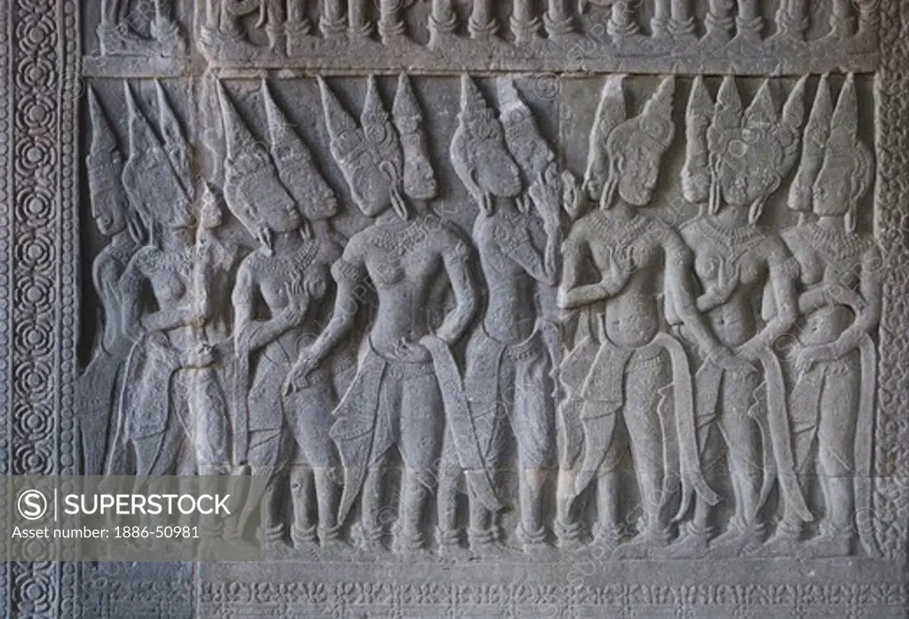 Stone carved bas relief of Hindu mythology in the south west corner pavilion at Angkor Wat, built in the 11th century by Suryavarman the 2nd,  -  Cambodia