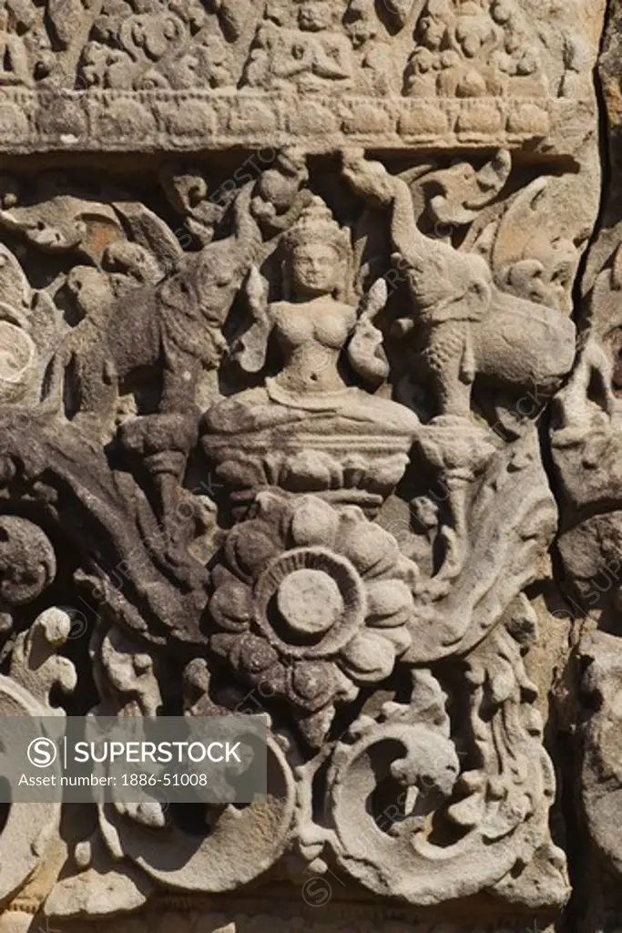Bas relief of Hindu deity with elephants at Ta Som, built by Jayavarman VII in the 12th century - Angkor Wat, Siem Reap, Cambodia