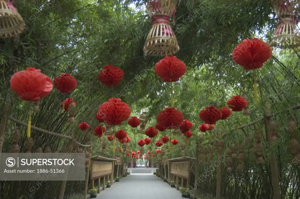 Red paper lanterns above a walkway in the River Viewing Pavilion Park - Sichuan Province, Chengdu, China