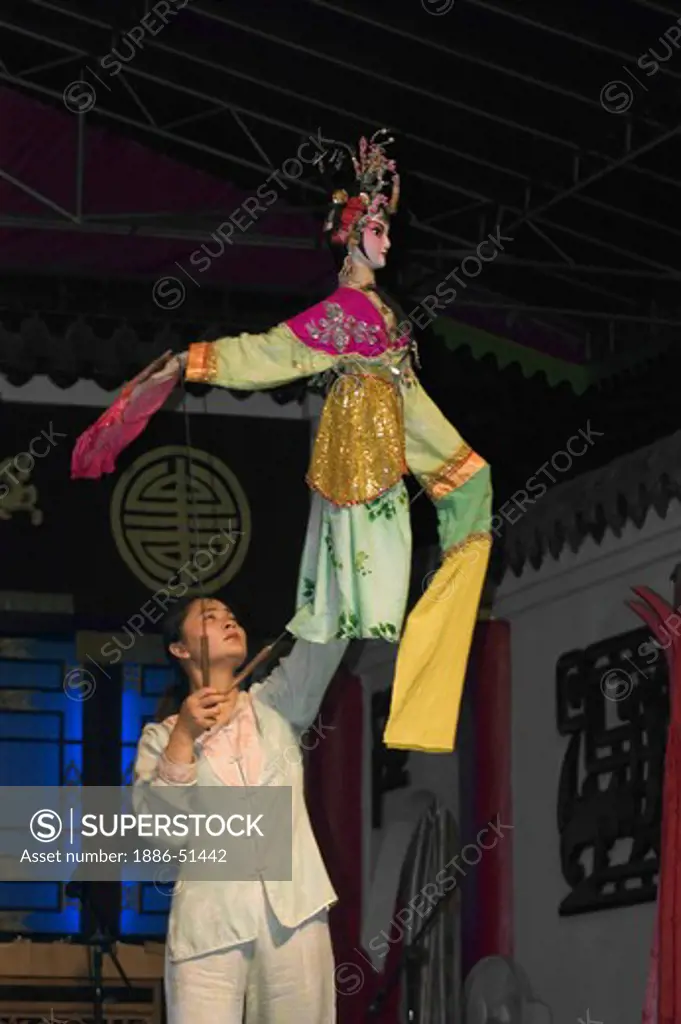 Female Puppet & puppeteer in a traditional Chinese Puppet Show - Chengdu, China in Sichuan Province