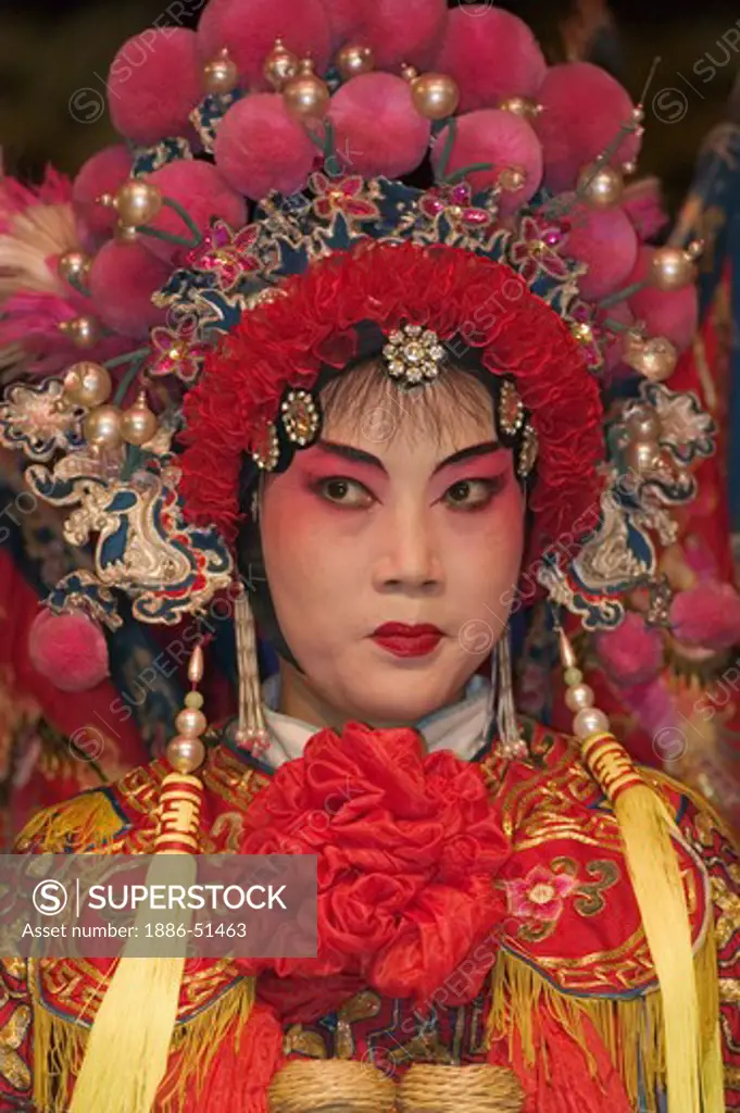 Female star sing in full costume with headdress at the Chinese Opera - Chengdu, China in Sichuan Province