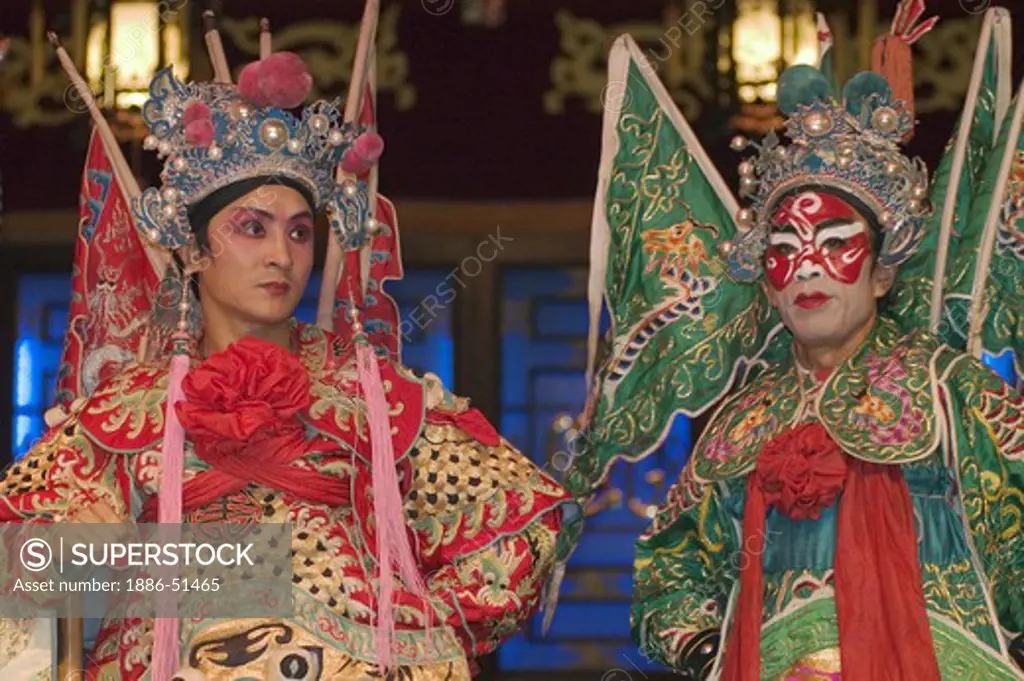 Two male stars in full costume at Chinese Opera - Chengdu, China in Sichuan Province