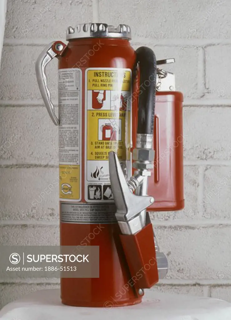 A Red FIRE EXTINGUISHER