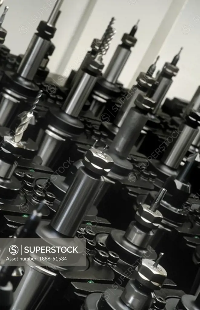 Wall of DRILL BITS for AUTOMATED (ROBOTIC) machine shop manufacturing aluminum parts - SILICON VALLEY, CA