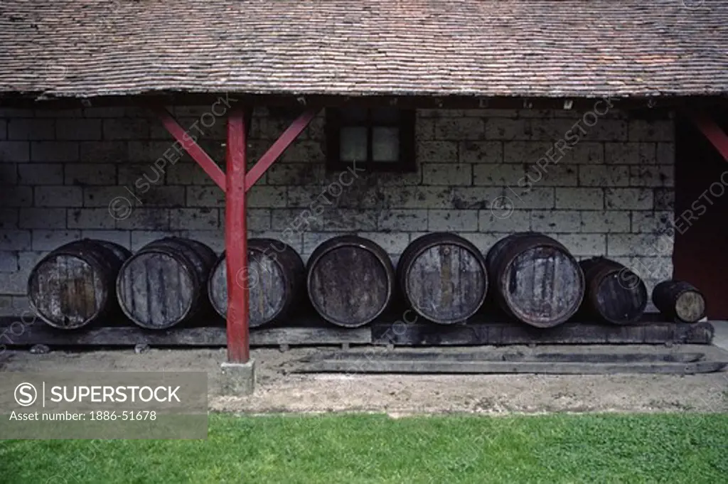 WOODEN BARRELS for AGING WINE outside of CHENENCOUX CASTLE WINERY - LOIRE VALLEY, FRANCE