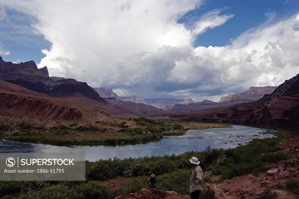 A view of the Colorado River and summer monsoon clouds at the UNKAR DELTA located at mile 73 - GRAND CANYON, ARIZONA