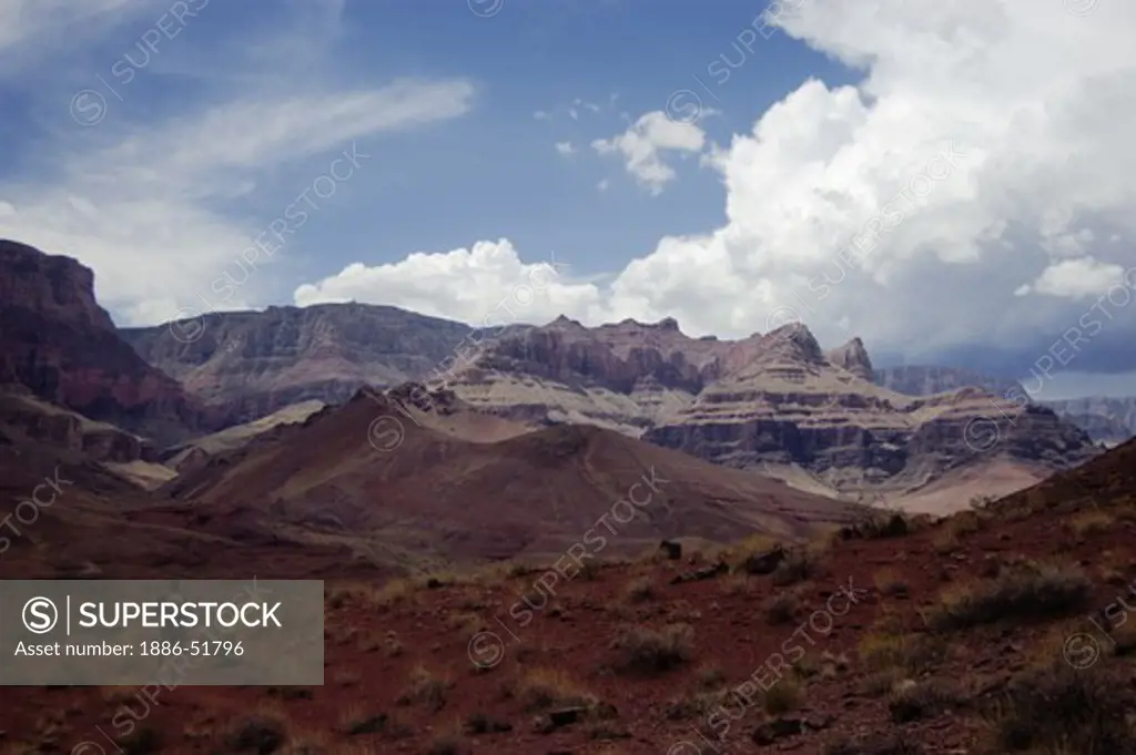 Summer monsoon clouds gather at the UNKAR DELTA located at mile 73 - GRAND CANYON, ARIZONA