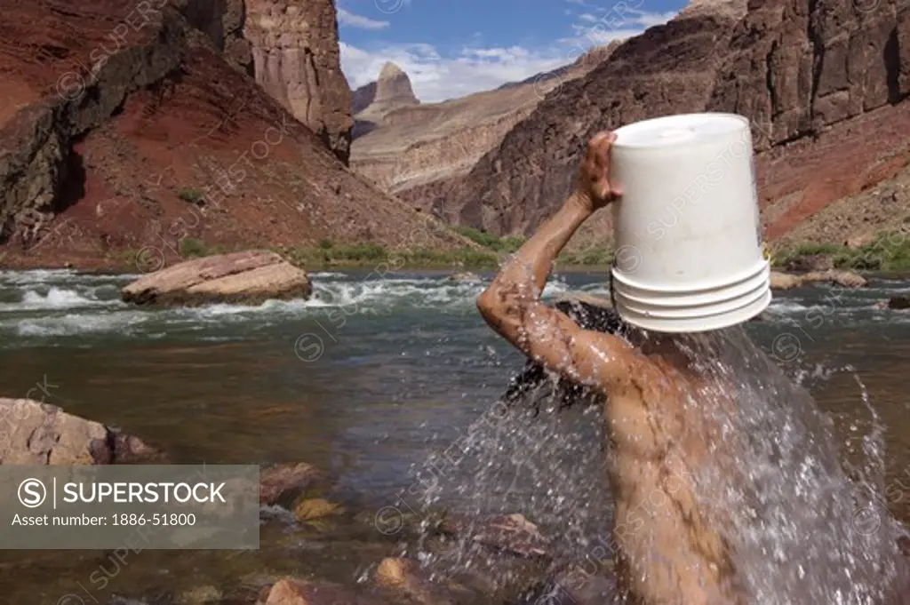 Cooling off in the Colorado River at Hance Camp located near mile 77 - GRAND CANYON, ARIZONA