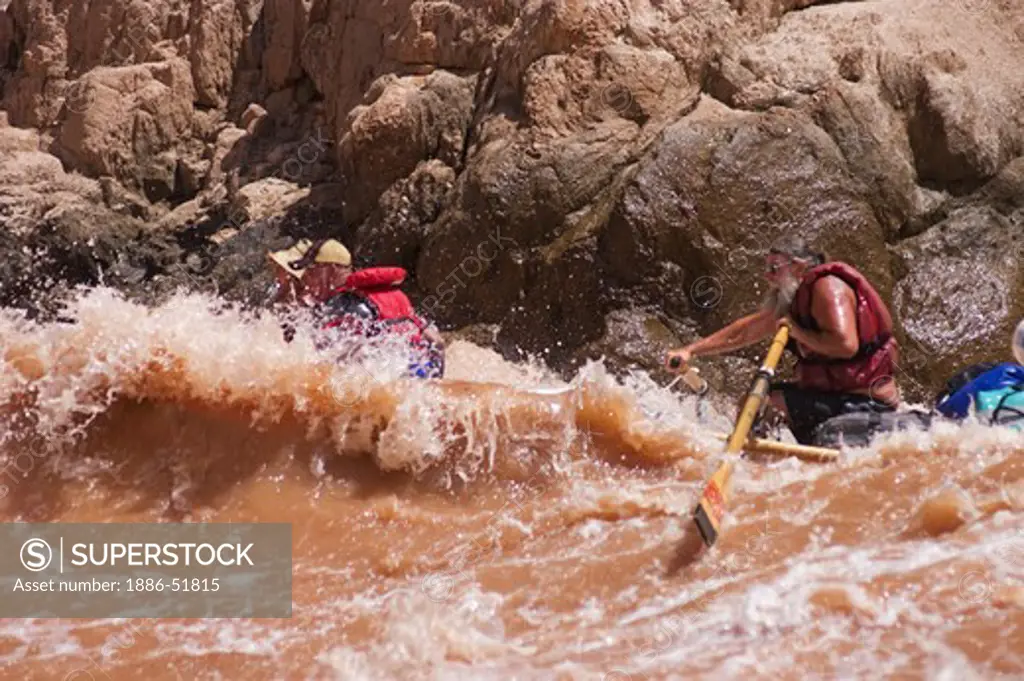 Rafters navigate GRANITE RAPID at mile 94, a Class 8 with a 17 foot drop and one of the largest on the Colorado River - GRAND CANYON, ARIZONA