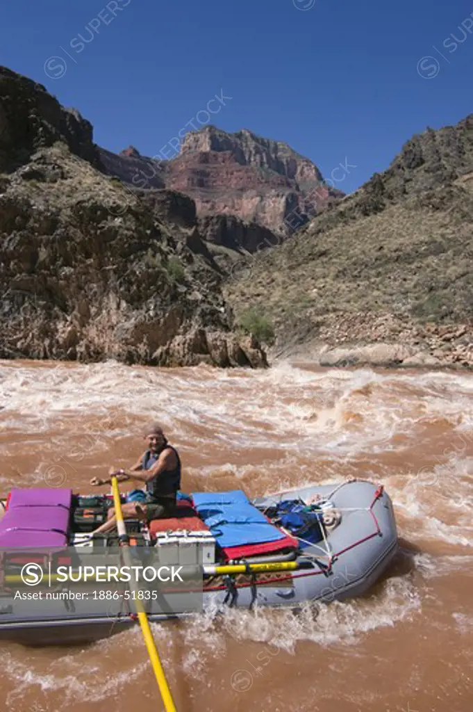 Rafters brave CRYSTAL RAPID a Class 9 with a 17 foot drop at mile 98 along the Colorado River - GRAND CANYON, ARIZONA