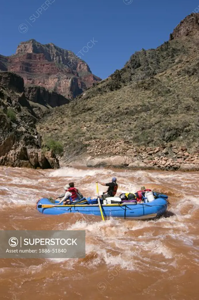 Rafters brave CRYSTAL RAPID a Class 9 with a 17 foot drop at mile 98 along the Colorado River - GRAND CANYON, ARIZONA