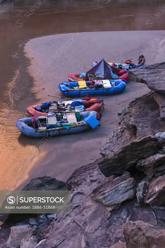 Rafts sit on the sandbar at Camp 119 as the Colorado River recedes - GRAND CANYON NATIONAL PARK, ARIZONA