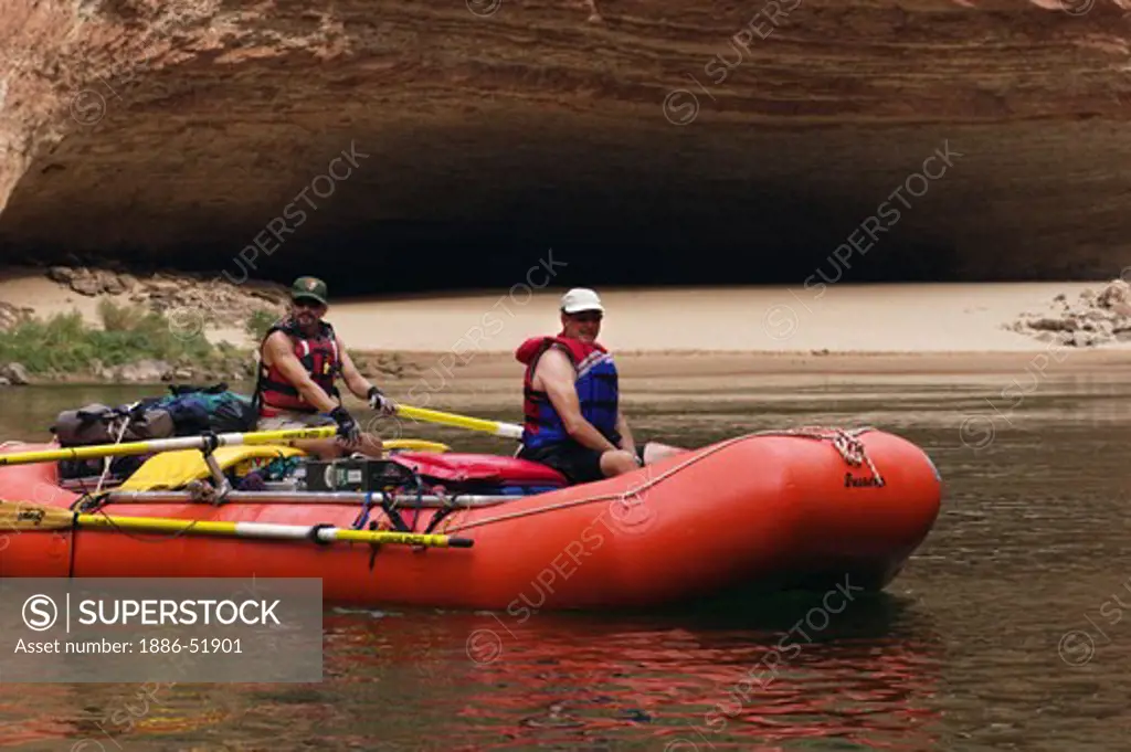 Rafters approaches REDWALL CAVERN, a large cave found at mile 33 along the Colorado River - GRAND CANYON,  ARIZONA