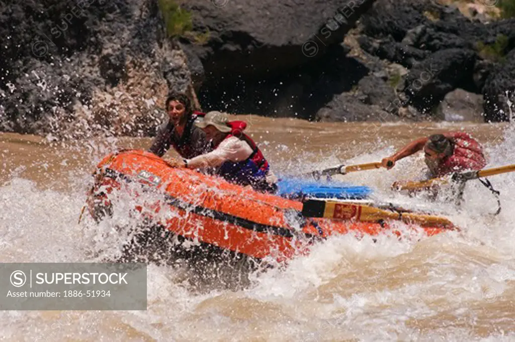 Rafters row through LAVA FALLS RAPID a Class 9 considered the toughest on the Colorado River at mile 179 - GRAND CANYON NATIONAL PARK, ARIZONA