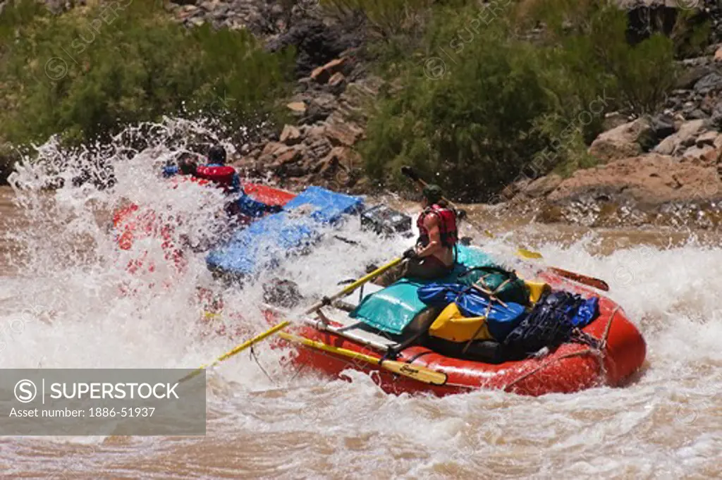 Rafters row through LAVA FALLS RAPID a Class 9 considered the toughest on the Colorado River at mile 179 - GRAND CANYON NATIONAL PARK, ARIZONA
