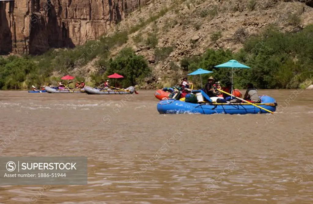 Umbrellas are used as shade during the hot summer sun on the Colorado River - GRAND CANYON NATIONAL PARK, ARIZONA