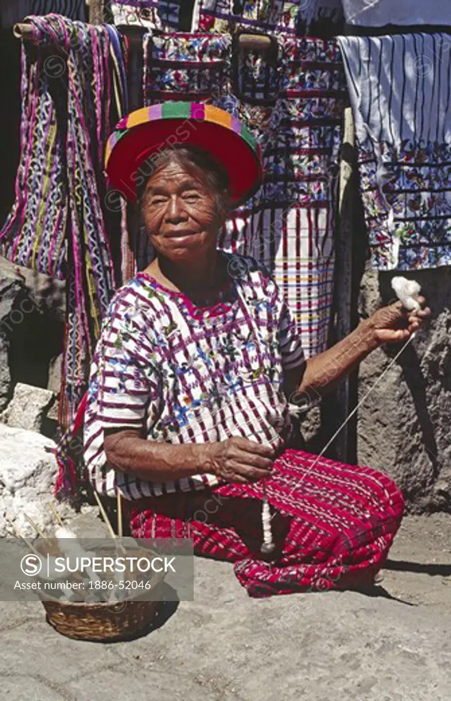 NATIVE TZUTUJIL WOMAN of SANTIAGO ATITLAN wearing traditional HUIPIL and TOCAYAL (headdress) - GUATEMALA