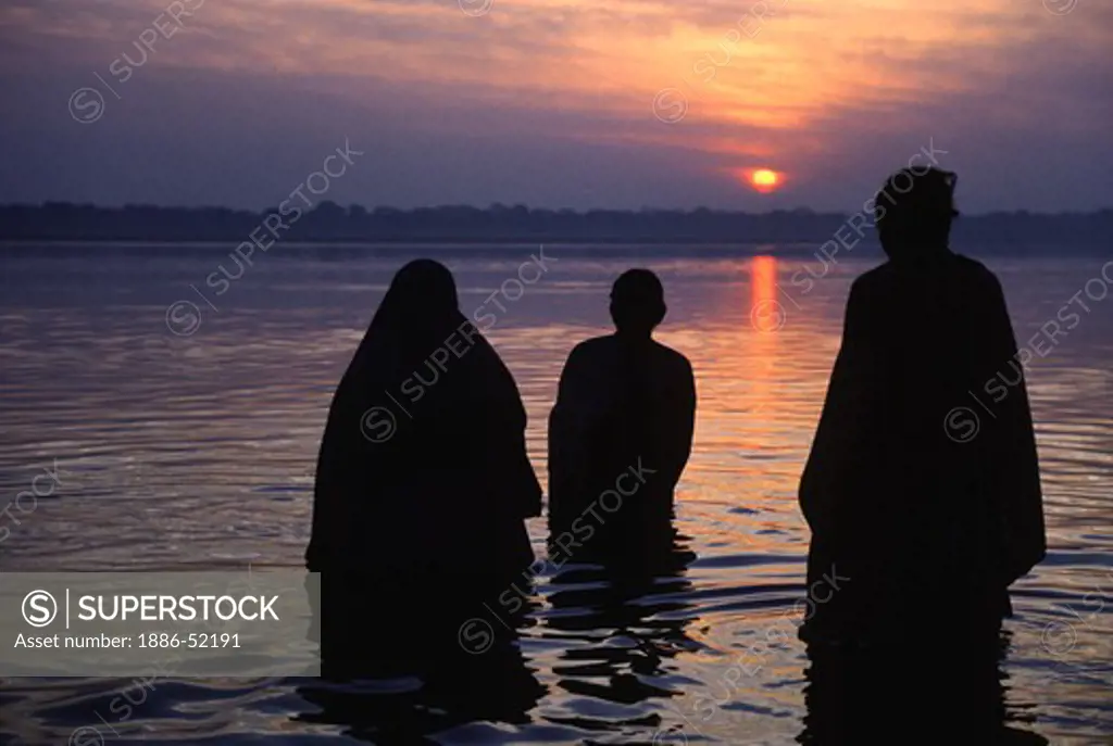 SUNRISE BATHING in the GANGES RIVER - VARANASI (BENARES), INDIA