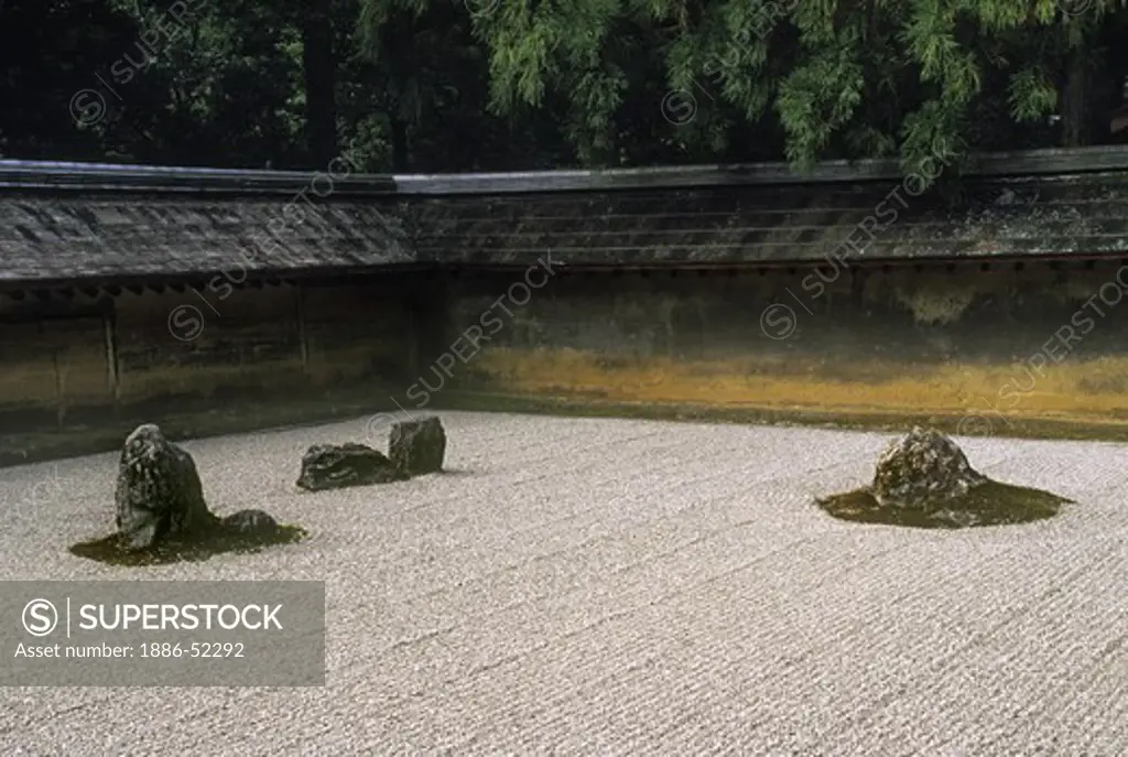 The famous RYOANJI ZEN ROCK GARGEN created in the 15th Cent. consists of 15 rocks in raked sand - KYOTO, JAPAN