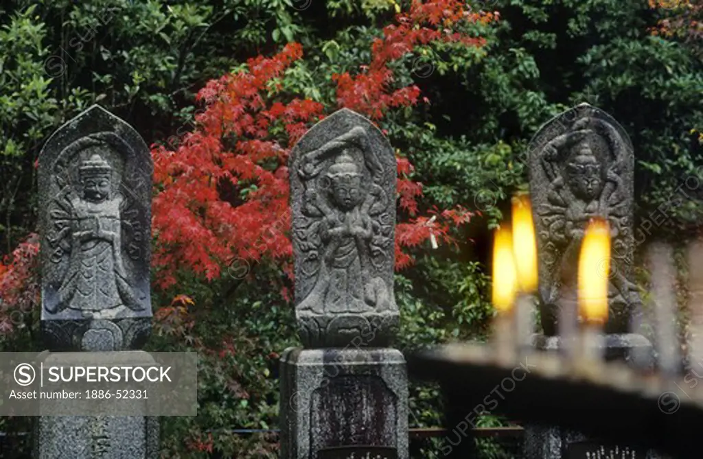 BUDDHIST figures outside DAISHOIN TEMPLE, Mimuro Branch of Shingon Buddhism - MIYA JIMA ISLAND, JAPAN