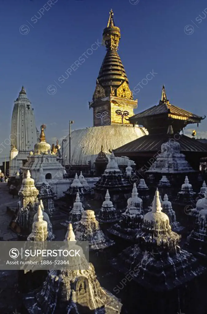 SWAYAMBHUNATH STUPA sits on a sacred KATHAMANDU site 2500 years old. BUDDHA'S EYES look in the 4 directions