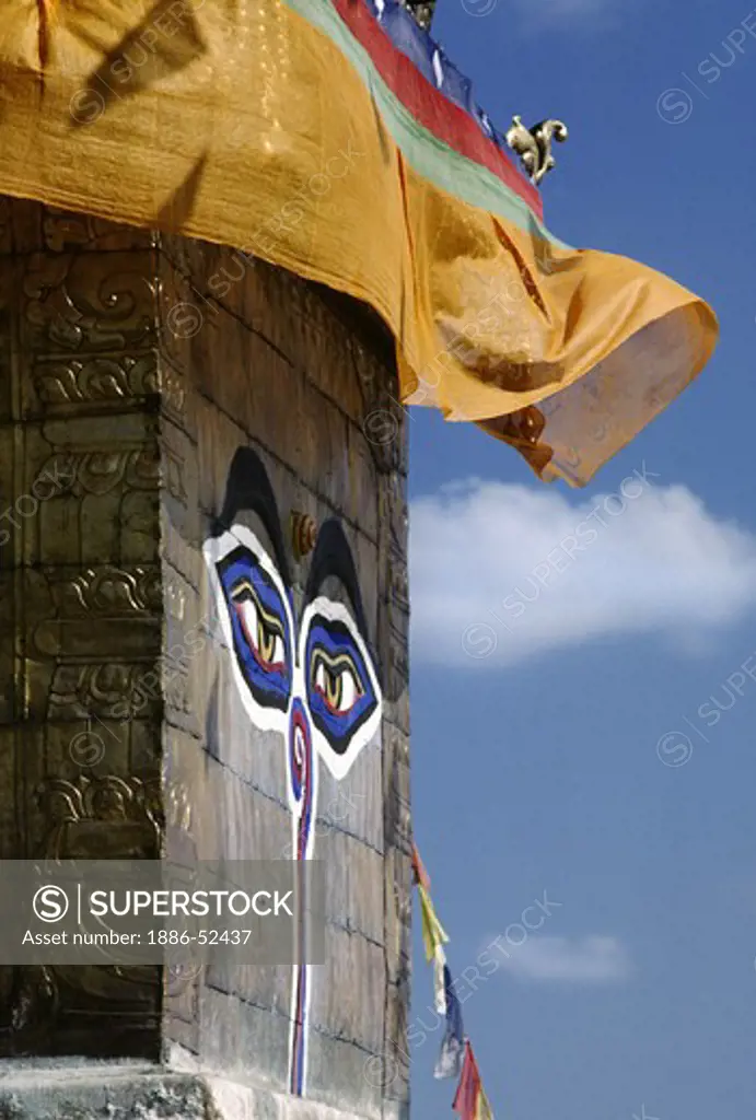 The all seeing EYES OF THE BUDDHA look out from one of the 4 sides of SWAYAMBUNATH STUPA - KATHAMANDU, NEPAL