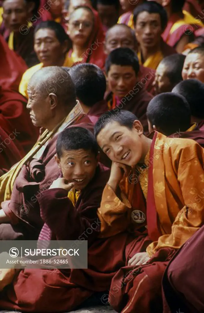 Nyingmapa sect Buddhist monks watch the  Monlam Chenmo dances, Katok Monastery - Kham, (Eastern Tibet), Sichuan, China